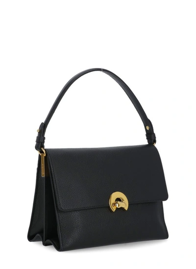 Shop Coccinelle Binxie Medium Shoulder Bag In Black
