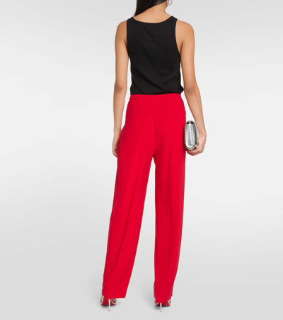 Shop Norma Kamali Low-rise Pleated Tapered Pants In Red