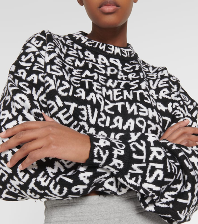 Shop Vetements Monogram Cropped Wool Sweater In Black