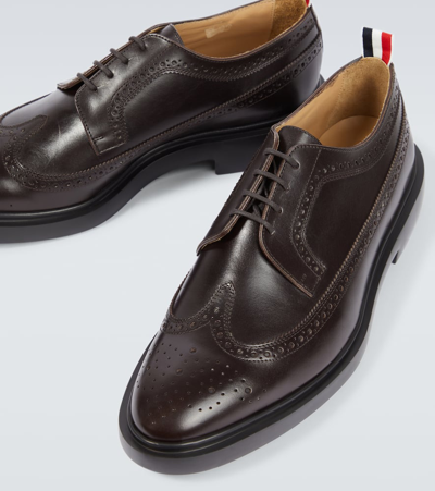 Shop Thom Browne Longwing Leather Derby Shoes In Brown