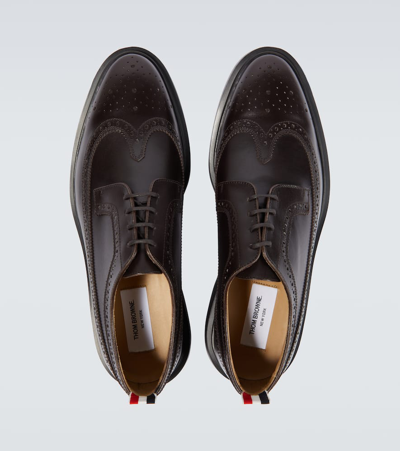 Shop Thom Browne Longwing Leather Derby Shoes In Brown