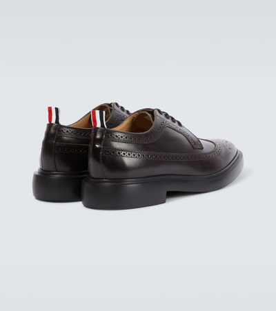 Shop Thom Browne Longwing Leather Derby Shoes In Brown