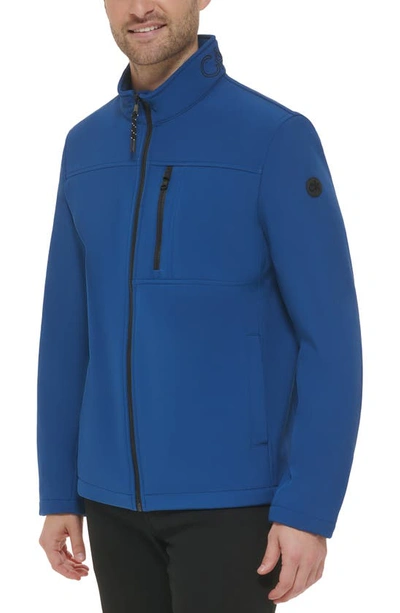 Shop Calvin Klein Softshell Jacket In Blue Edge