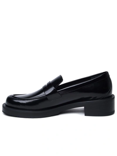 Shop Stuart Weitzman Black Shiny Leather Loafers