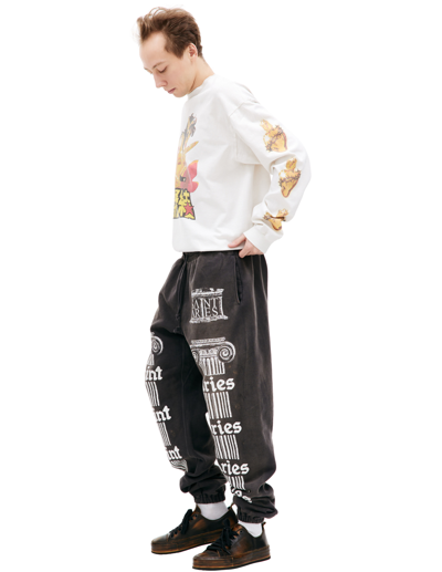 Shop Saint Michael Х Aries Printed Sweatpants In Black