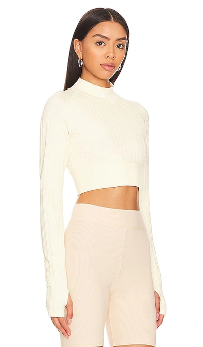 Shop Alo Yoga Seamless Cable Knit Top In Cream