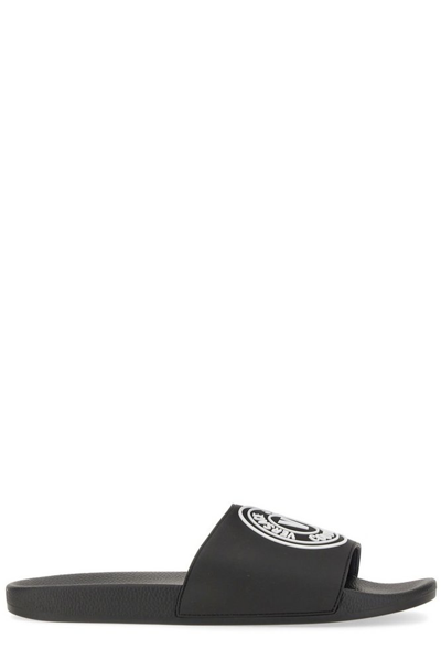 Shop Versace Jeans Couture Logo Embossed Slides In Black