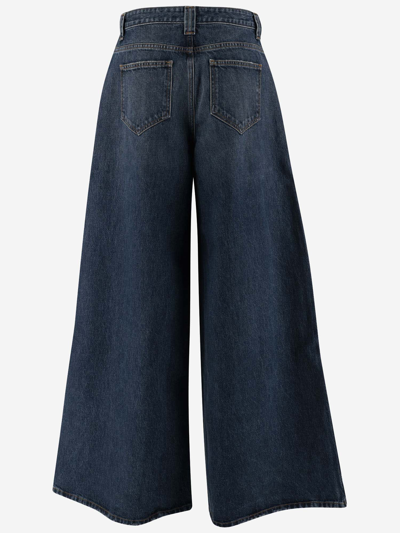Shop Khaite Oversized Flared Jeans In Archer