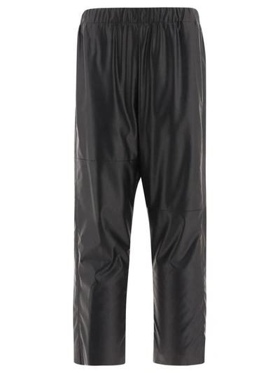 Shop Mm6 Maison Margiela Stretch Faux Leather Trousers In Black