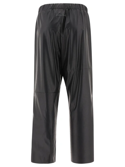 Shop Mm6 Maison Margiela Stretch Faux Leather Trousers In Black