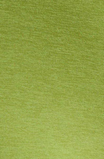 Shop Beyond Yoga Space Dye Out Of Pocket Side Pocket High Waist Capri Leggings In Fern Green Heather