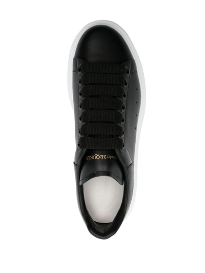 Shop Alexander Mcqueen Oversized Leather Sneakers In Black