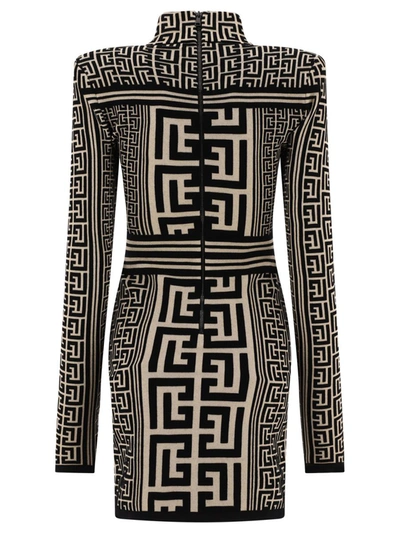 Shop Balmain Monogrammed Knit Dress In Black