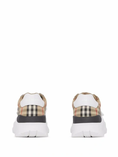 Shop Burberry New Regis Sneakers In White