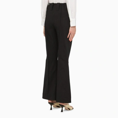 Shop Ganni Pinstriped Flared Trousers In Blue