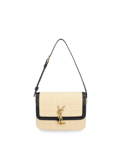 Shop Saint Laurent Handbags In Butter/black