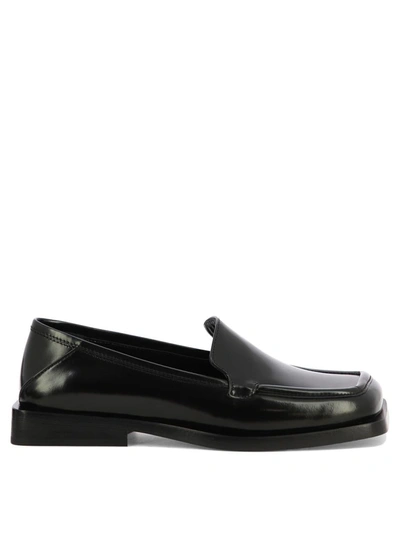Attico Micol Asymmetric-toe Leather Loafers In Black