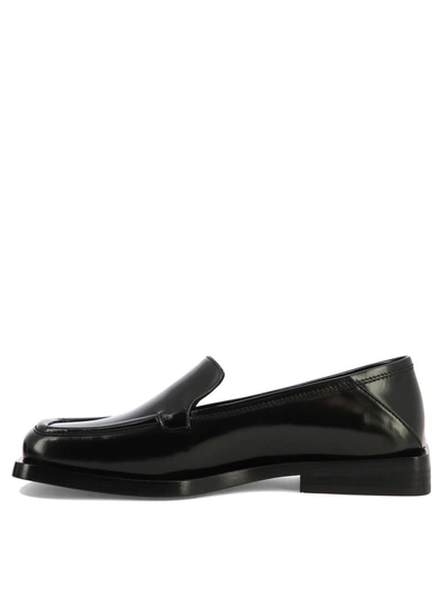 Attico Micol Asymmetric-toe Leather Loafers In Black