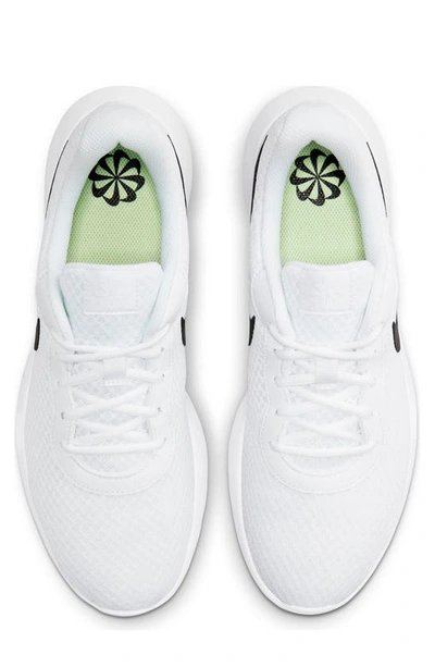 Shop Nike Tanjun Athletic Sneaker In White/black-barely Volt
