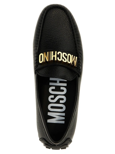 Shop Moschino Logo Loafers Black