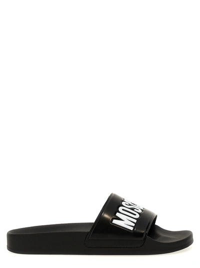Shop Moschino Logo Slides Sandals Black