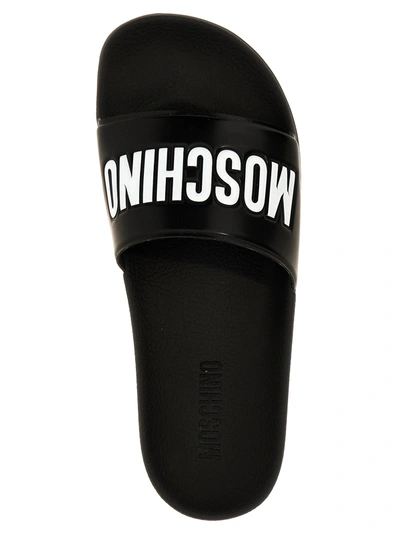 Shop Moschino Logo Slides Sandals Black