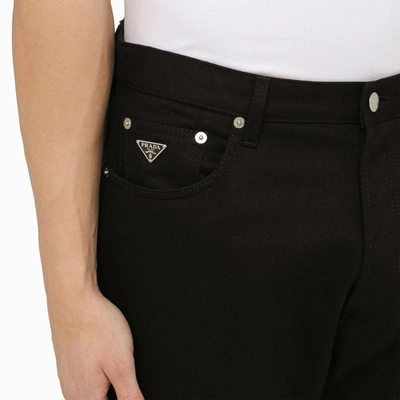 Shop Prada Black Jeans With Metal Logo Triangle Men