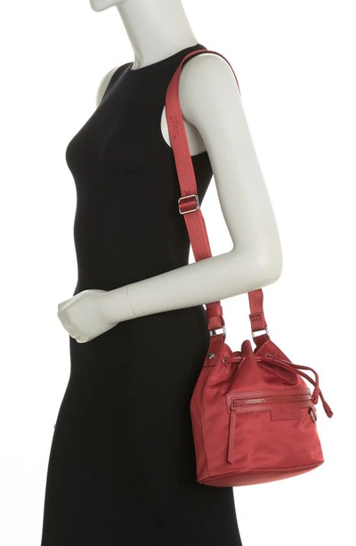 Shop Longchamp Neoprene Bucket Bag In Red