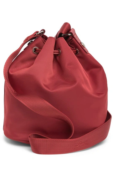 Shop Longchamp Neoprene Bucket Bag In Red