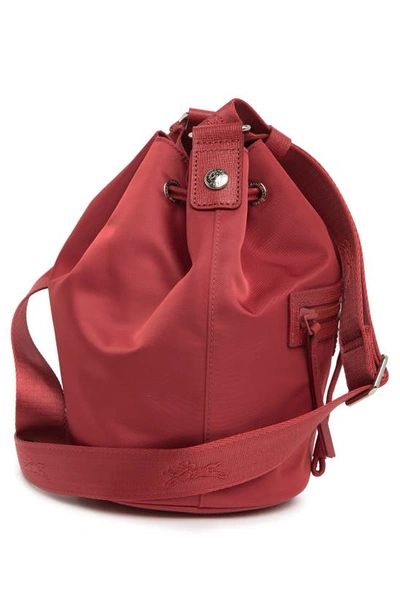 Shop Longchamp Neoprene Bucket Bag In Red