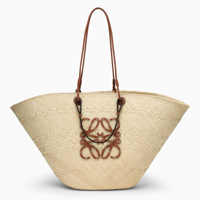 Shop Loewe Large Anagram Basket Tote In Iraca Palm Women In Silver