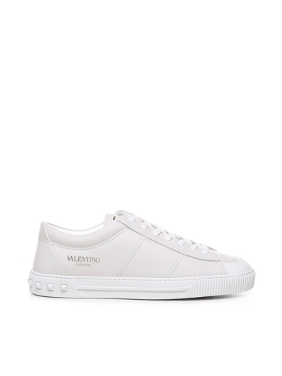 Shop Valentino Sneakers With Rockstud Details In Bianco/bianco