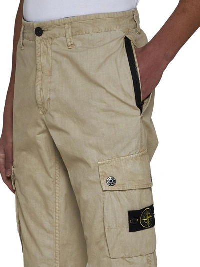 Shop Stone Island Trousers In Sand