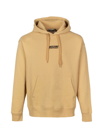Shop Moschino Logo Embroidered Drawstring Hoodie In Beige