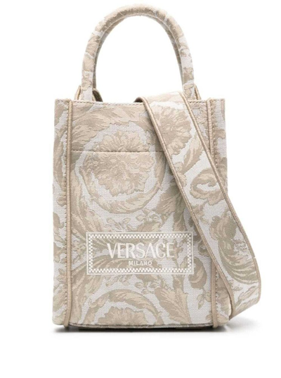 Shop Versace Athena Barocco Mini Top Handle Bag In Beige