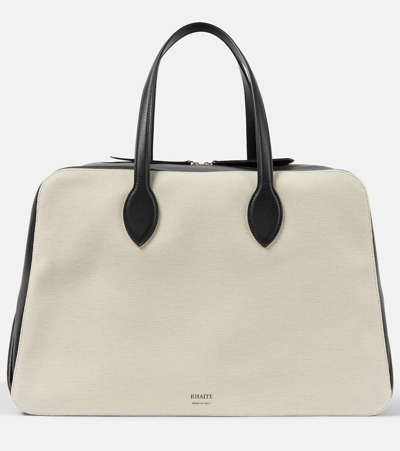 Shop Khaite Maeve Large Canvas And Leather Duffel Bag In Neutrals