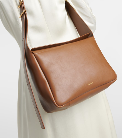 Shop Jil Sander Flap Messenger Small Leather Shoulder Bag In Brown