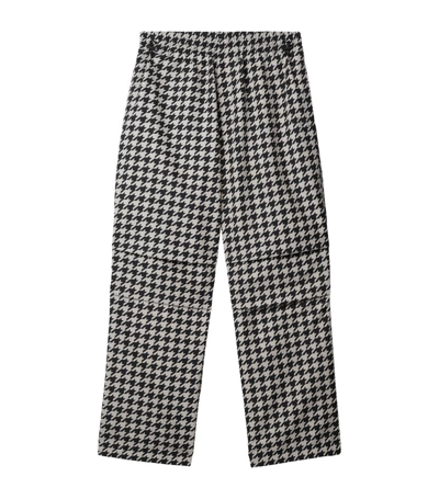 Shop Burberry Wide-leg Houndstooth Trousers In Black