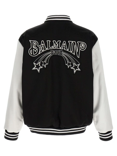 Shop Balmain 'embroidered Badges Satined Varsity' Bomber Jacket In White/black