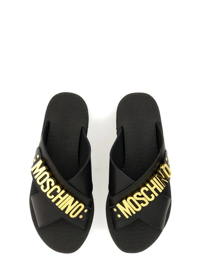 Shop Moschino Wedge Sandals In Black