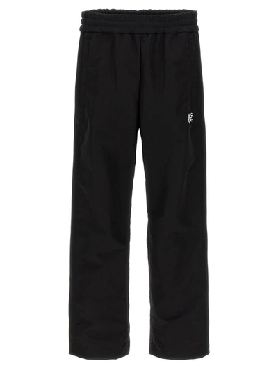 Shop Palm Angels 'monogram Track' Joggers In White/black