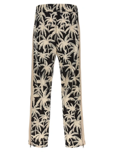 Shop Palm Angels 'palms Allover' Joggers In White/black