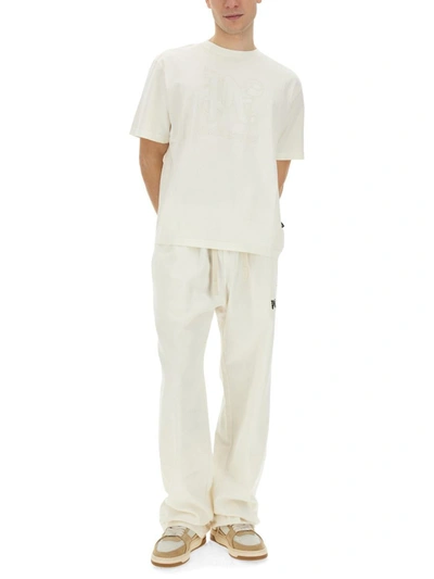 Shop Palm Angels Pants With Logo In White