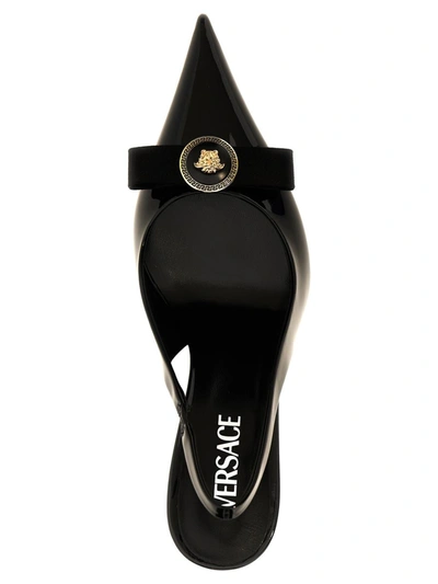Shop Versace 'gianni Ribbon' Pumps In Black