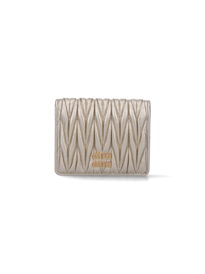 Shop Miu Miu Small Logo Wallet In Gold