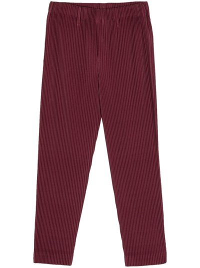 Shop Issey Miyake Pleated Straight Leg Trousers In Red