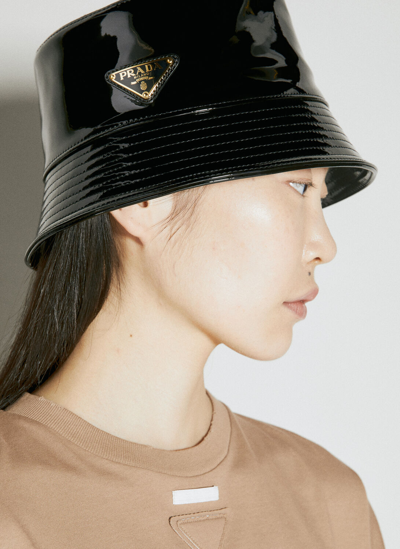 Shop Prada Logo Plaque Patent Leather Bucket Hat In Black