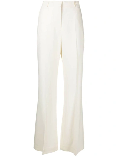 Shop Totême Toteme Flared Evening Trousers In Ivory