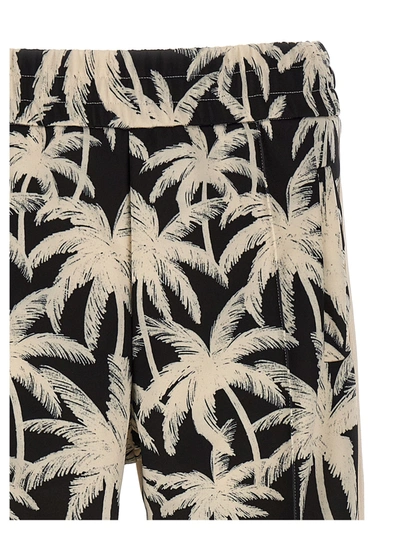 Shop Palm Angels Palms Allover Pants White/black