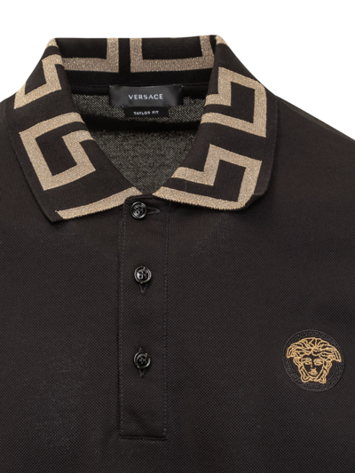 Shop Versace With Greca Jacquard Polo Shirt In Nero